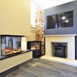 Centreline Showroom Media Wall with log burner