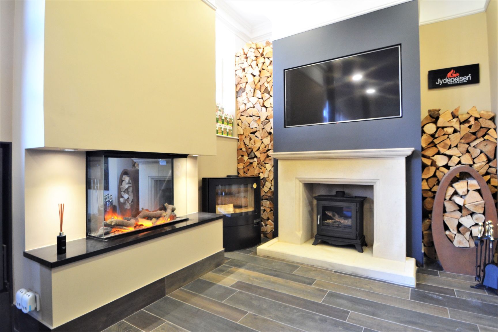 Centreline Showroom Media Wall with log burner