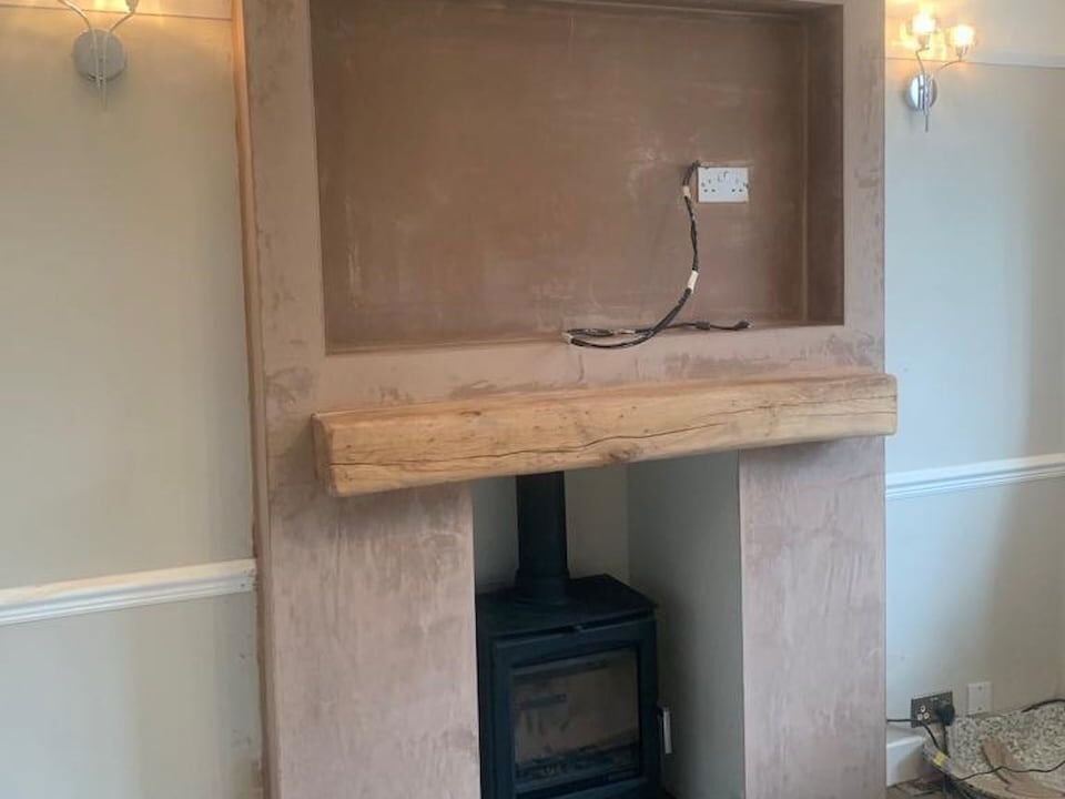 Log burner media wall
