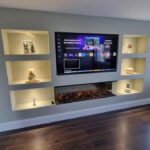 Media walls for electric fires