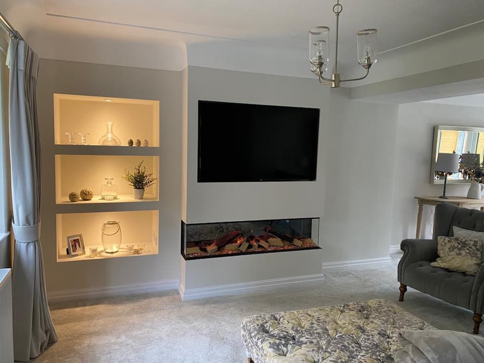Media wall with shelving space