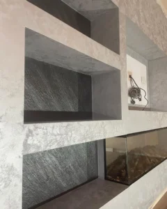 Venitian media wall shelving area