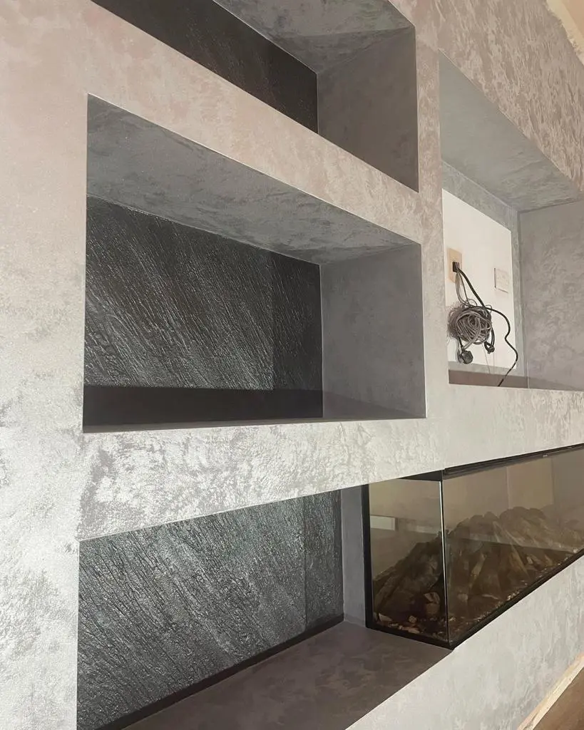 Venitian media wall shelving area