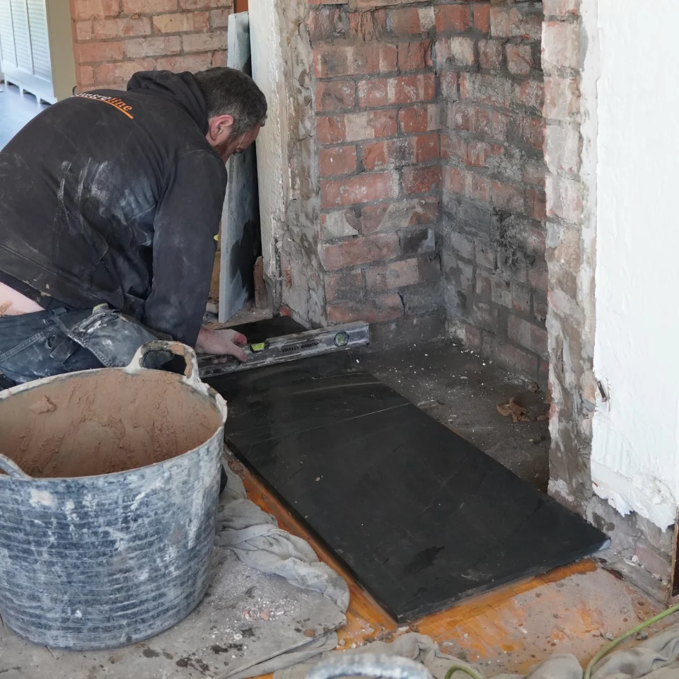 wood burner installer fitting stove - fitting hearth