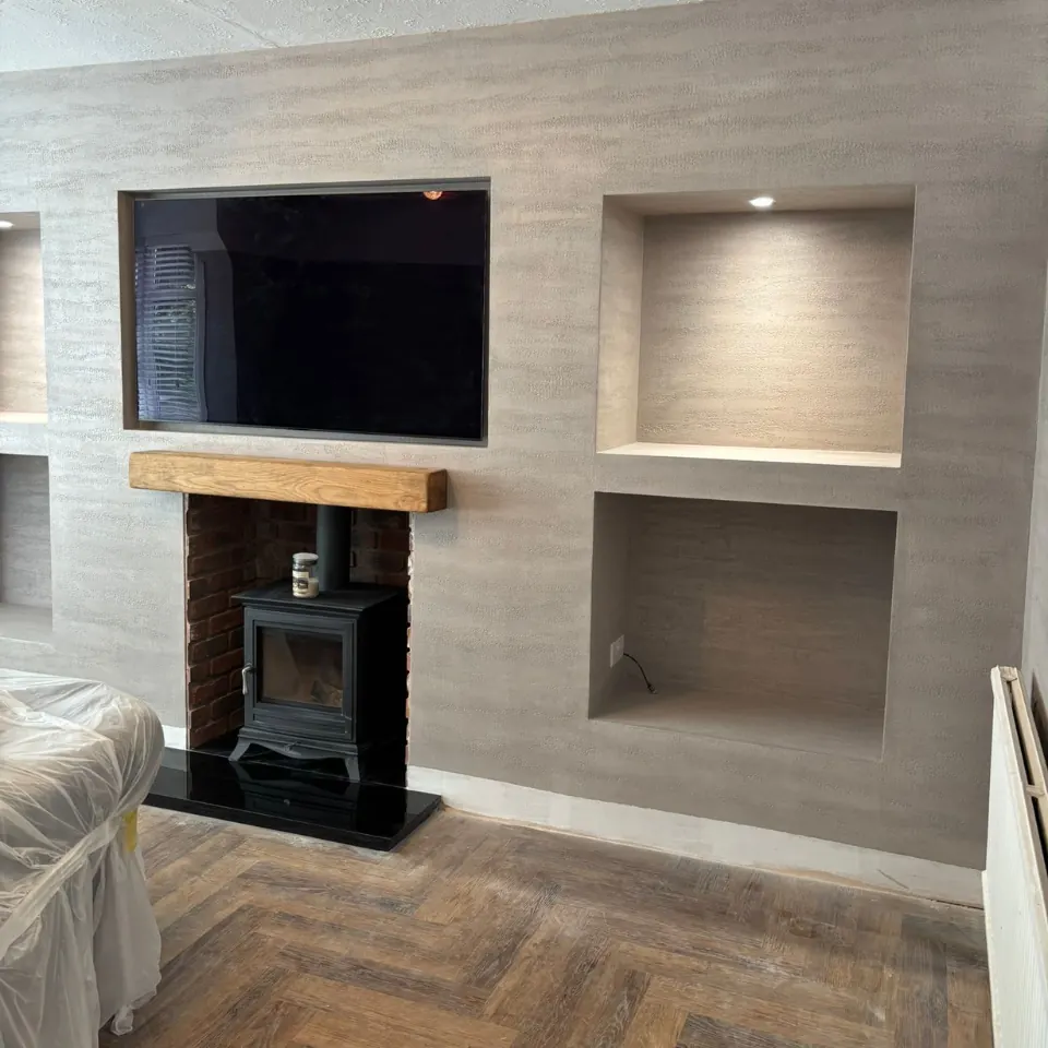wood burning stove in media wall
