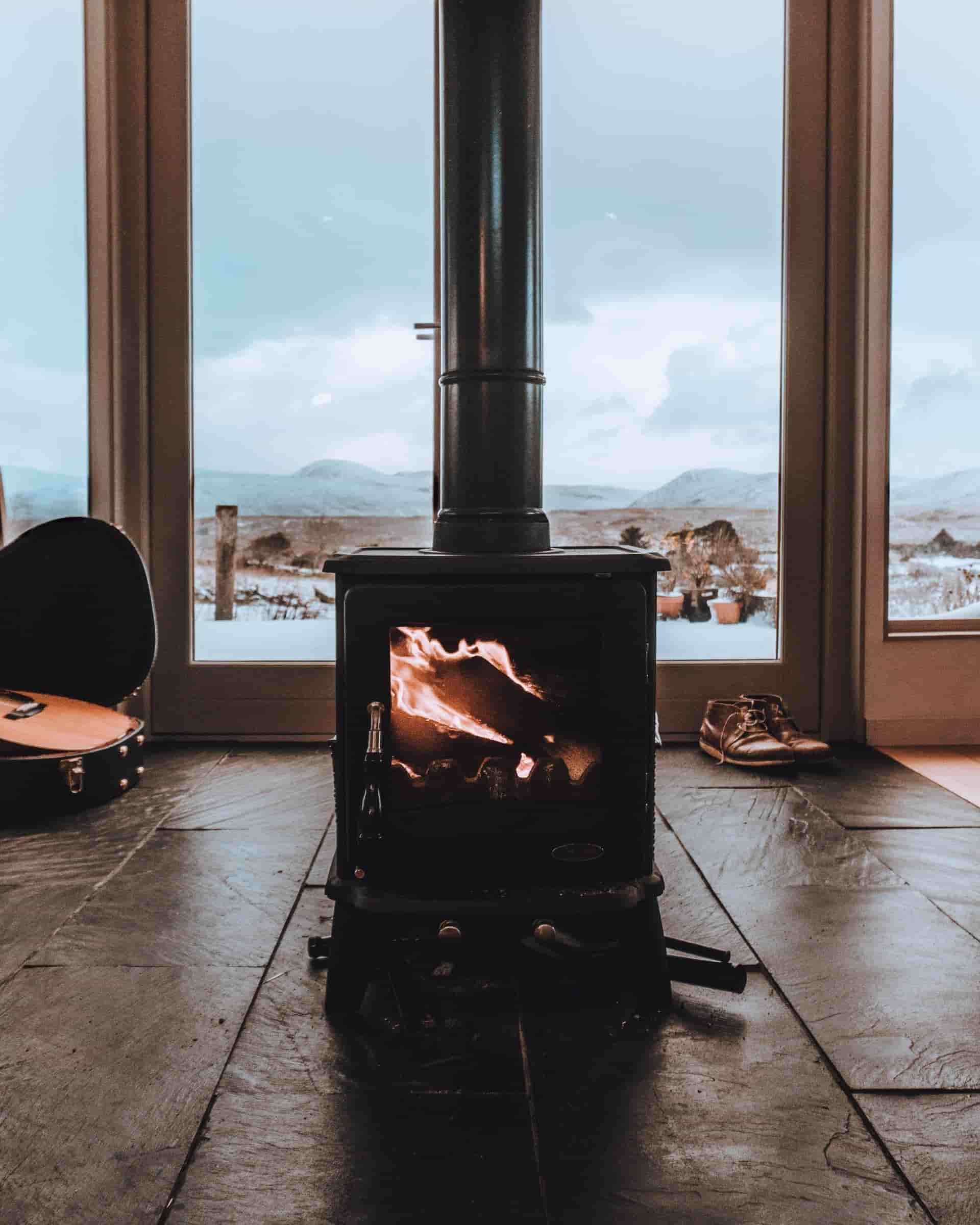 A Log Burner in a modern open plan room