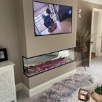 3 sided electric fire in chimney breast media wall