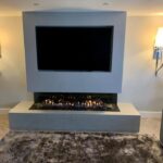 Gas fire media wall chimney breast