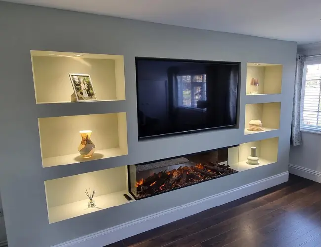 White Media Wall with holes for shelving storage
