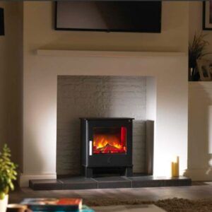 ACR Malvern Electric Stove on cream wall with a candle