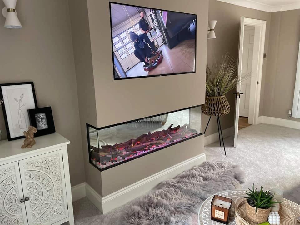 3 sided electric fire in chimney breast media wall