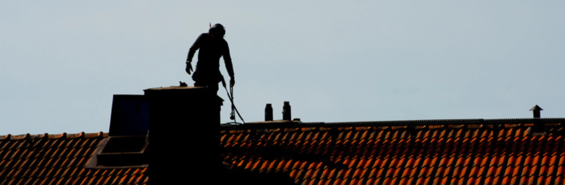 chimney sweeping in action