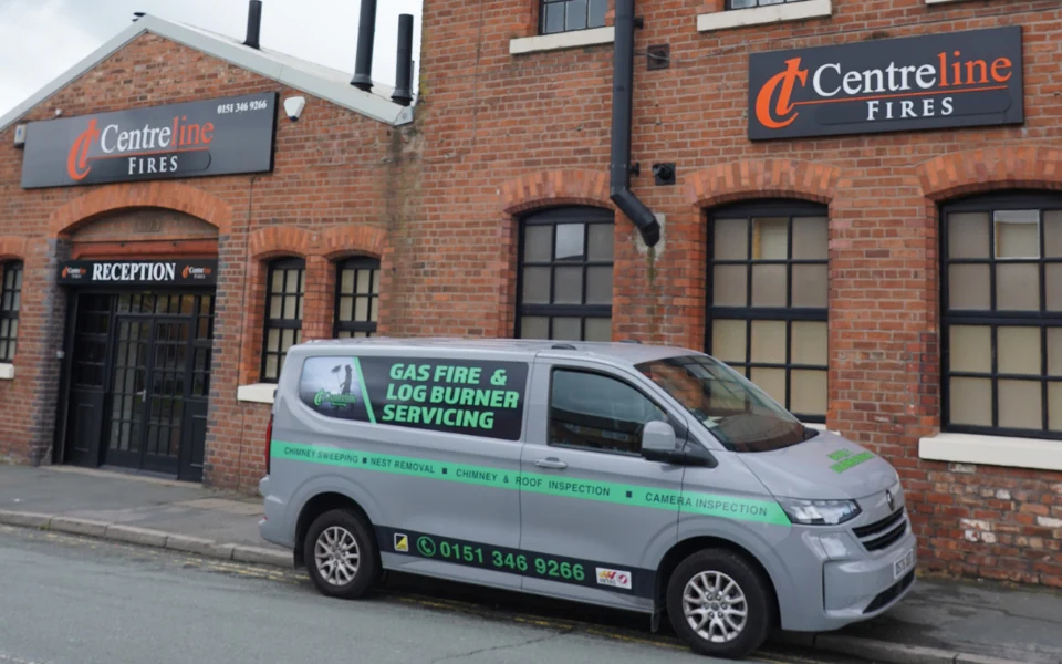 fire servicing costs. Image of servicing van outside centreline fires showroom