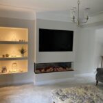 Media wall with shelving space