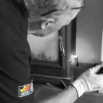 experienced hetas installer dave installing fire